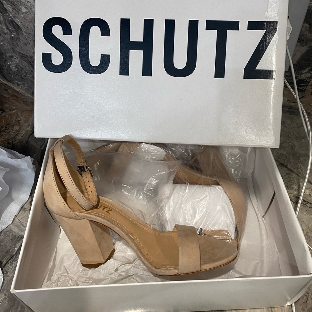 Schutz woman’s sandals with heels.